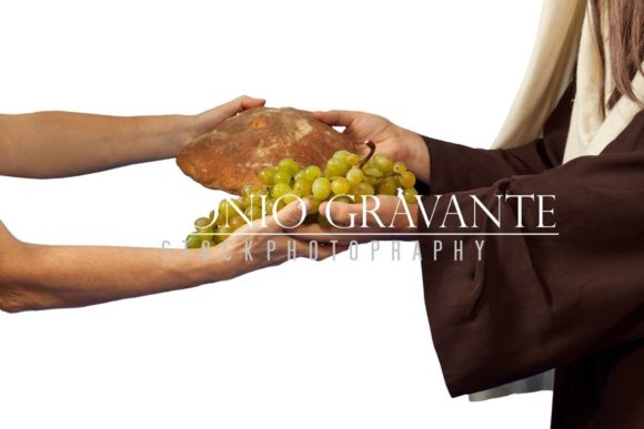 The Real Meaning Behind Jesus Giving Bread and Grapes